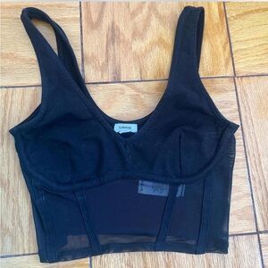 Garage - black extra small shirt. The bottom half is mesh, great quality.